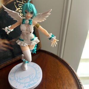 Angel-Themed Cake Topper with Turquoise Highlights